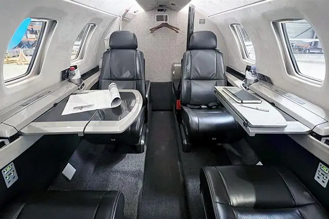 Cessna Citation M2 cabin with black leather seats