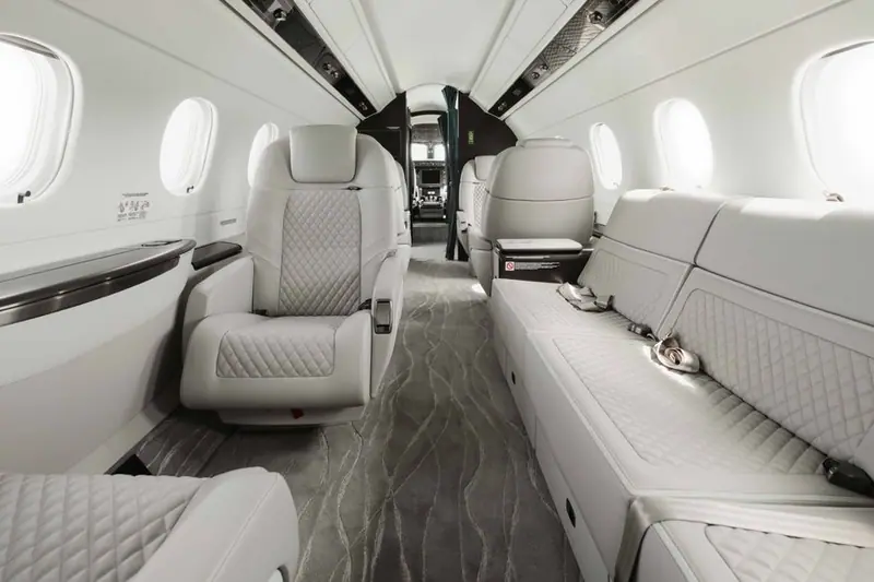 Embraer Praetor 600 cabin with a divan